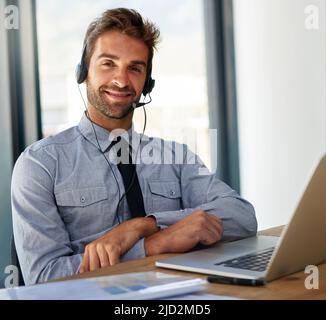 No one said success would be easy. Cropped shot of a handsome young businessman in his office. Stock Photo