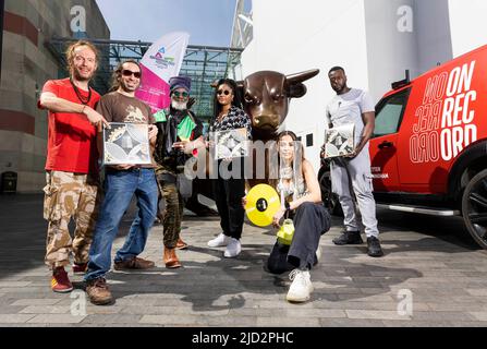 EDITORIAL USE ONLY (left to right) Friendly Fire Band members Bongo Damo, Robi Don and Tomlin Mystic, Sanity, Bambi Bains (kneeling) and Dapz on the Map at the Bullring in Birmingham, to mark the release of 'On Record', a concept album specially produced and commissioned by Birmingham Music Archive for the Birmingham 2022 Festival. Picture date: Friday June 17, 2022. Stock Photo