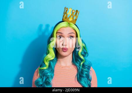 Photo of charming selfish lady with tiara on head pout lips kiss her boyfriend isolated on blue color background Stock Photo