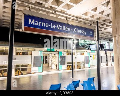 Paris, France - 04/05/2022: Information sign in Disneyland stop Marne La Valle Chessy railroad station. This is last stop of Disneyland train. Stock Photo