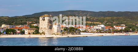 Ouranoupolis , Greece - June, 1, 2015: Ouranoupolis town and houses view, harbor,  ancient Tower of Ouranoupolis , Athos, Greece. View from the Aegean Stock Photo