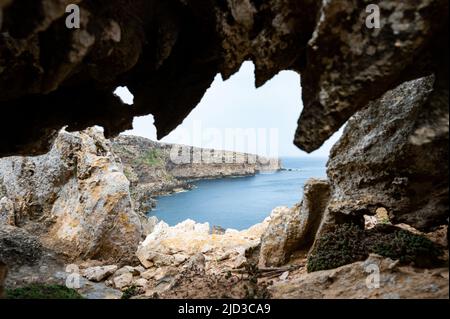 The necropolis of Cala Morell, (Menorca) a spectacular cove surrounded by high cliffs. Stock Photo