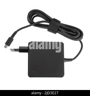 laptop power adapter, laptop spare part on white background, top view Stock Photo