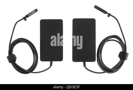 laptop power adapter, laptop spare part on white background, top view Stock Photo