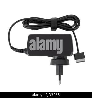 laptop power adapter, laptop spare part on white background, top view Stock Photo