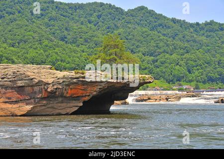 West Virginia's beautiful Kanawha Falls (New River) offer great fishing around cliffs and ledges for smallmouth bass, walleye and trout. Stock Photo