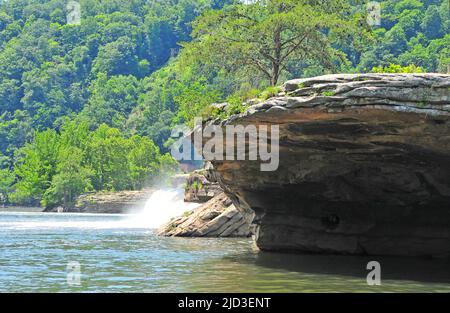 West Virginia's beautiful Kanawha Falls (New River) offer great fishing around cliffs and ledges for smallmouth bass, walleye and trout. Stock Photo