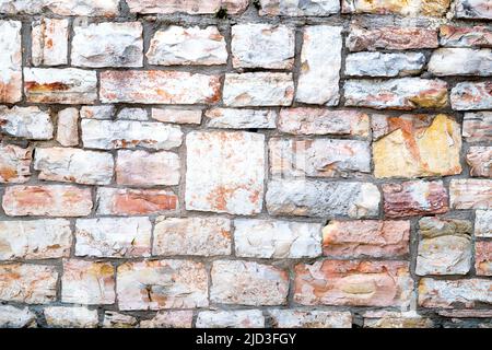 Background with a texture of a stone wall. Stock Photo