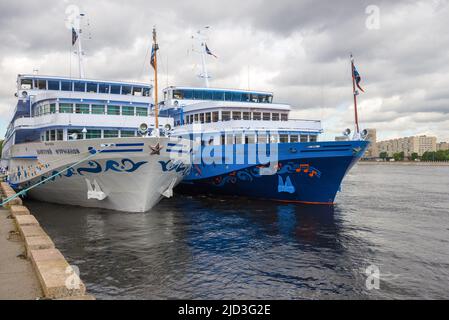 SAINT PETREBURG, RUSSIA - JUNE 22, 2018: Two cruise ships moored on the Neva river Stock Photo