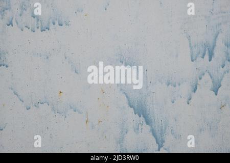 Abstract background an old, gray metal wall with blue streak of paint Stock Photo