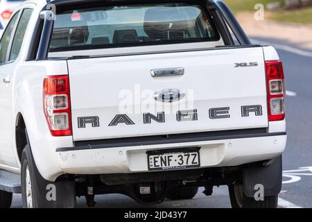 2021 white Ford Ranger XLS utility ute truck parked in Sydney,NSW,Australia rear view Stock Photo