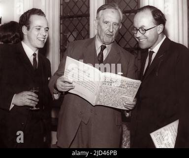 J.R.R. Tolkien (center), British author of The Hobbit and The Lord of the Rings, at the UK launch on March 14, 1968 at Crosby Hall in Chelsea of the book The Road Goes Ever On: a Song Cycle, written by Tolkien with music by Donald Swann (right). An LP record of this song cycle was recorded earlier on June 12, 1967 as Poems and Songs of Middle Earth, with Donald Swann on piano and William Elvin (left) singing. The album also included Tolkien himself reading six poems from The Adventures of Tom Bombadil. Stock Photo