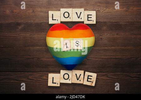 Love is love. Inspirational Gay Pride photo with rainbow spectrum heart ...