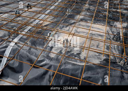 preparing the formwork for the foundation of a new house with steel Stock Photo