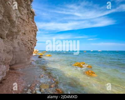 Seascape mountain Conero National Park, view of the Sassi Neri beach - black stone beach, Adriatic coast,Sirolo, Marche, Italy, Europe Stock Photo