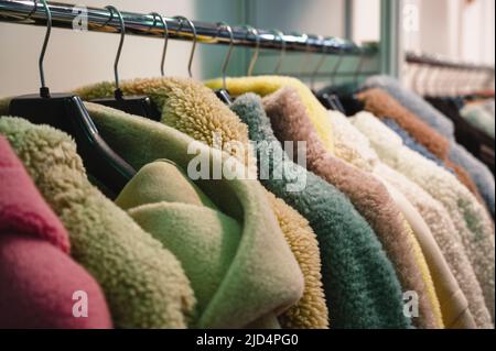 Collection of trendy coats and jackets made of faux fur Stock Photo