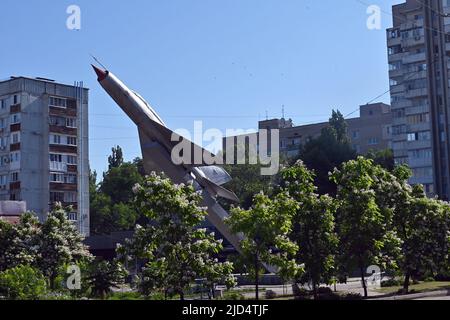 NOVOMOSKOVSK, UKRAINE - JUNE 17, 2022 - The Mikoyan-Gurevich MiG-21 supersonic jet fighter installed in the central square in 1985 commemorates the 29 Stock Photo