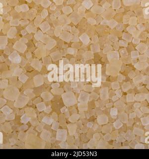 Brown sugar crystals texture background, close up shot Stock Photo