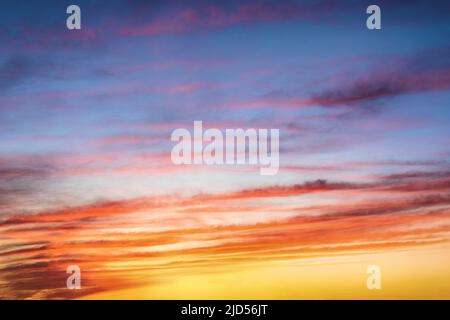 Bright and saturated sky with illuminated cirrus clouds as background or copy space Stock Photo