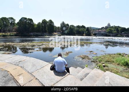 Turin. 18th June, 2022. Photo taken on June 18, 2022 shows the Po river in Turin, Italy. A heatwave swept across Italy this week, sparking emergencies in at least four cities and putting half of the agricultural production in the north at drought risk. Credit: Str/Xinhua/Alamy Live News Stock Photo