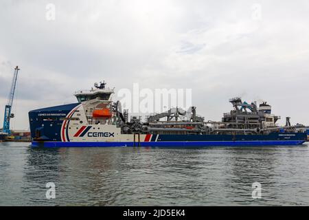 Poole, Dorset, UK. 18th June, 2022. Cemex Go Innovation Hopper Dredger arrives in Poole Harbour. CEMEX Go Innovation is the first of Damen's new Marine Aggregate Dredger (MAD) class. The MAD 3500 vessel is the result of close co-operation between CEMEX and Damen and represents the first of a new generation of efficient and economical dredgers. 103.5m long aggregate dredger. Credit: Carolyn Jenkins/Alamy Live News Stock Photo