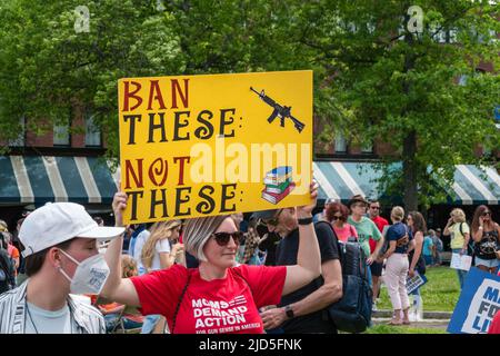 Boston, MA, US-June 11, 2022: March for Our Lives Protest Rally in Boston's Christopher Columbus Park in the North End. Protesters holding anti-gun si Stock Photo