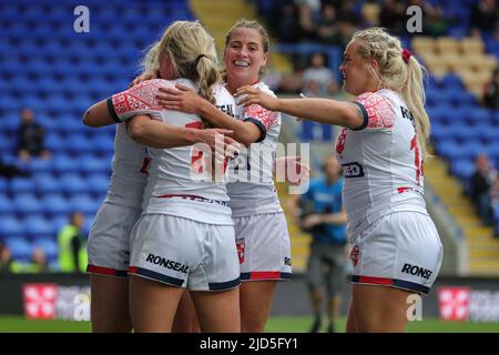 Amy Hardcastle #4 of the England women national rugby league team celebrates her try with Tara Jones and makes the score 14-0 Stock Photo