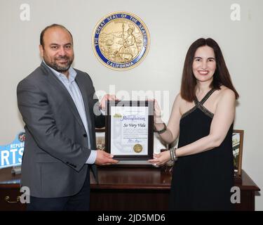 Van Nuys, California, USA. 17th June, 2022. California State Assemblymember Adrin Nazarian presents actress Vida Ghaffari with a Certificate of Recognition at the Van Nuys District Office in Van Nuys, California.  Credit: Sheri Determan Stock Photo