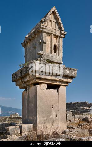 Lycian pillar tomb in ruins of ancient city Xanthos, Turkey Stock Photo