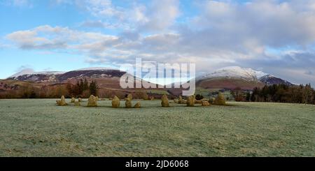 Castlerigg Stone Circle with snow capped Skiddaw and Blencathra in the distance. Stock Photo