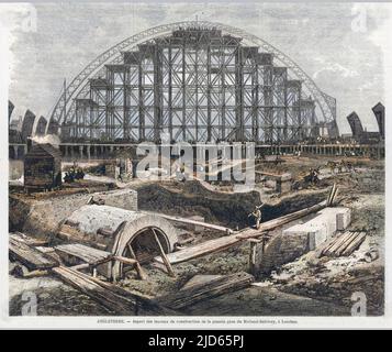 Construction of St. Pancras Station. The magnificent canopy of the new Midland Railway terminus takes shape near the Euston Road. Colourised version of : 10002444       Date: 1868 Stock Photo