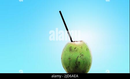 Coconut drink isolated on blue background. Stock Photo