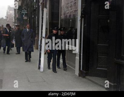 Is walking under a ladder really bad luck? No, of course not, as these two young men in uniform demonstrate! Colourised version of : 10167513       Date: early 1930s Stock Photo