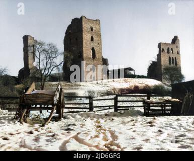 The snow covered ruins of Sheriff Hutton Castle, Rydale, North Yorkshire, England. It was built in 1379 by Bertram de Bulmer, Sheriff of York, as a fortified manor house. Colourised version of : 10181443       Date: 14th century Stock Photo