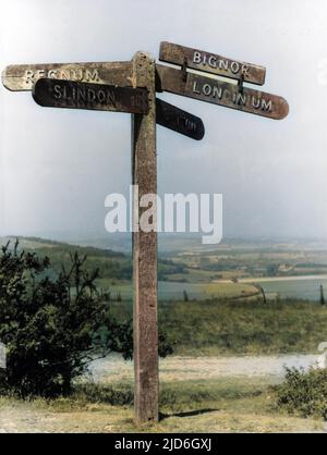 This signpost, near Bignor, Sussex, England, is on Stane Street and denotes the course of this Roman military road, which runs from Chichester to London. Colourised version of : 10187398       Date: 1960s Stock Photo