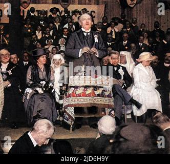 David Lloyd-George (1863-1945), 1st Earl Lloyd-George of Dwyfor, the Welsh Liberal statesman, taken during a speech at the Welsh National Eisteddfod, Birkenhead, 6th September 1917. Also on the platform were Mrs. Lloyd-George (front row with dark hat) and Lord Leverhulme (front row, right). Colourised version of: 10218773       Date: 1917 Stock Photo