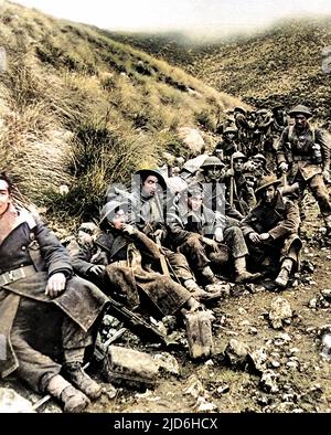 A group of British infantry taking a break, near Monte Camino, Italy, 1943.   This unit had just been involved in six days of continuous fighting, storming strongly defended German positions on Monte Camino and Monte Maggiore. Colourised version of: 10218105       Date: 1943 Stock Photo