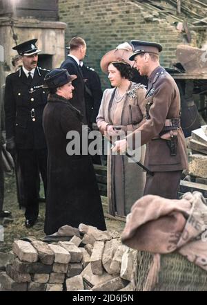 King George VI and Queen Elizabeth talking to Mrs Eals who was saved by taking cover in an Anderson shelter when her house was bombed during an air raid in September 1940. Colourised version of: 10435832       Date: 1940 Stock Photo