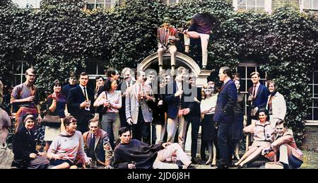 Saturday morning regulars gather on the lawn in front of The Bush Hotel in Farnham High Street, Surrey, England. Colourised version of: 10546656       Date: 1965 Stock Photo
