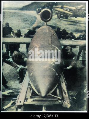 Loading a V1 rocket into the launch pad. Use of these rockets accelerated after the start of the Second World War. Colourised version of: 10088971       Date: Circa 1940 Stock Photo