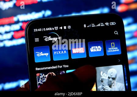 In this Photo illustration a Disney Hotstar application seen displayed on an android smartphone . Stock Photo