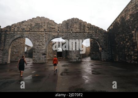Children exploring the ruins of Trial Bay Gaol at South West Rocks, NSW Australia Stock Photo