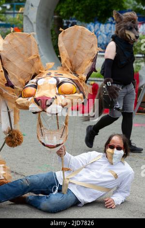 Seattle, Washington, USA. 18th June, 2022. Members of the Clouded Leopard ensemble wait for the Fremont Solstice Parade to begin. The iconic, annual parade returned after a three-year hiatus due to the coronavirus pandemic. Credit: Paul Christian Gordon/Alamy Live News Stock Photo