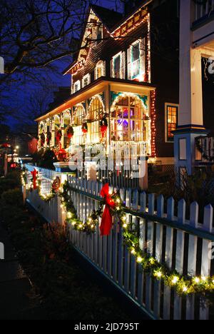 Pretty Victorians are decorated for the Christmas Season in Cape May New Jersey Stock Photo