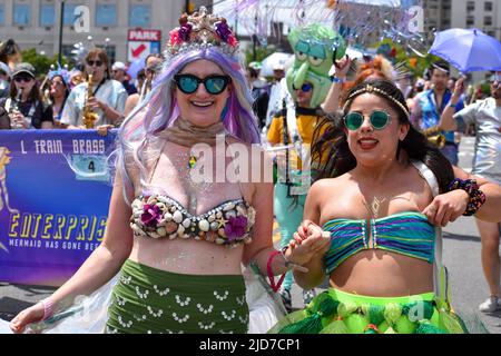 Brooklyn, New York, USA. 18th June, 2022. Parade participants pose at the 40th Annual Mermaid Parade at New York's Coney Island on June 18, 2022. (Credit Image: © Ryan Rahman/Pacific Press via ZUMA Press Wire) Credit: ZUMA Press, Inc./Alamy Live News Stock Photo