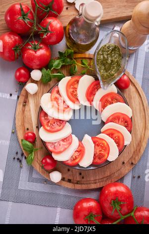 Caprese salad - sliced mozzarella cheese and tomatoes Stock Photo