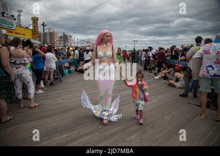 New York, USA. 18th June, 2022. People participate in the 2022 Mermaid Parade at Coney Island in New York, the United States, June 18, 2022. The Mermaid Parade made its in-person return on Saturday after a two-year hiatus due to COVID-19 pandemic. Credit: Michael Nagle/Xinhua/Alamy Live News Stock Photo