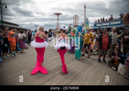 New York, USA. 18th June, 2022. People participate in the 2022 Mermaid Parade at Coney Island in New York, the United States, June 18, 2022. The Mermaid Parade made its in-person return on Saturday after a two-year hiatus due to COVID-19 pandemic. Credit: Michael Nagle/Xinhua/Alamy Live News Stock Photo