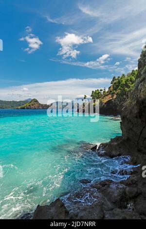 Beautiful turquoise sea at Mahoro Island with Masare & Pahepa Islands beyond. Mahoro, Siau Island, Sangihe Archipelago, North Sulawesi, Indonesia Stock Photo