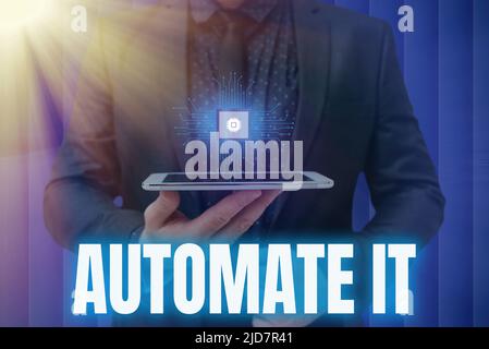 Text showing inspiration Automate It. Word for convert process or facility to be operated automatic equipment. Man holding Screen Of Mobile Phone Stock Photo